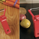 Illustration for article titled You Must Mosh While Using the Rock n Roll Veggie Peeler